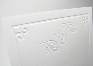 Embossed border monogram wedding invitation